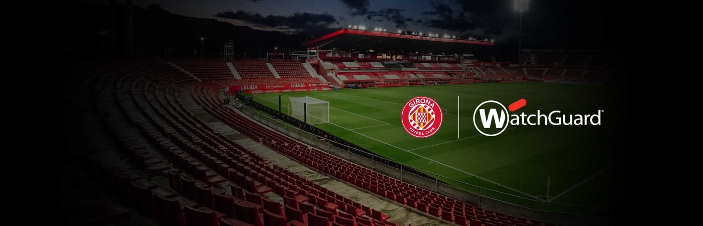 Girona FC and WatchGuard logos over a wide view of the Girona stadium