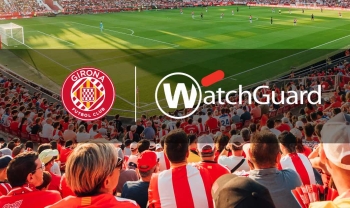 Girona FC + WatchGuard logos on top of a football stadium filled with fans